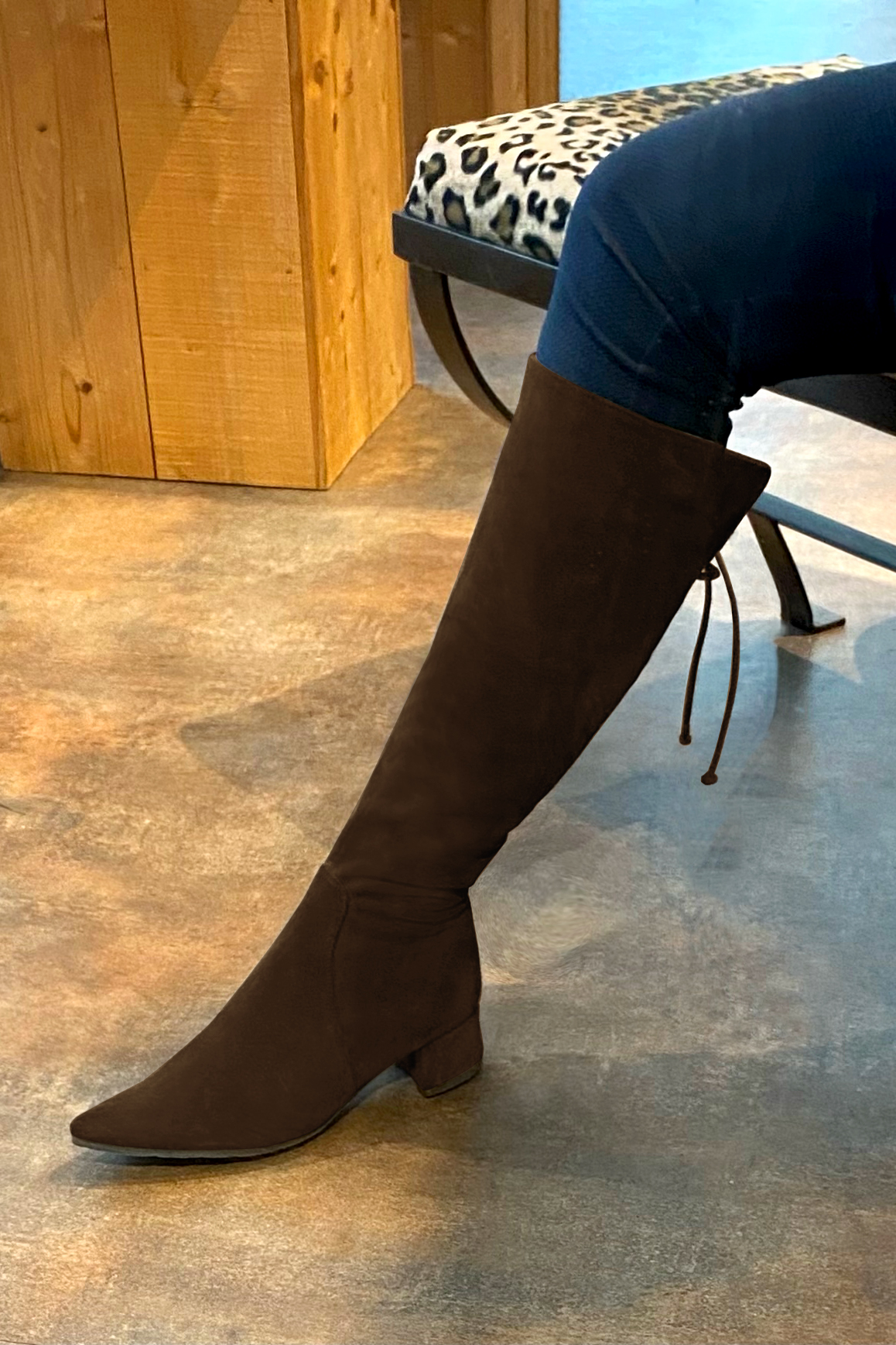 Dark brown women's knee-high boots, with laces at the back. Tapered toe. Low flare heels. Made to measure. Worn view - Florence KOOIJMAN